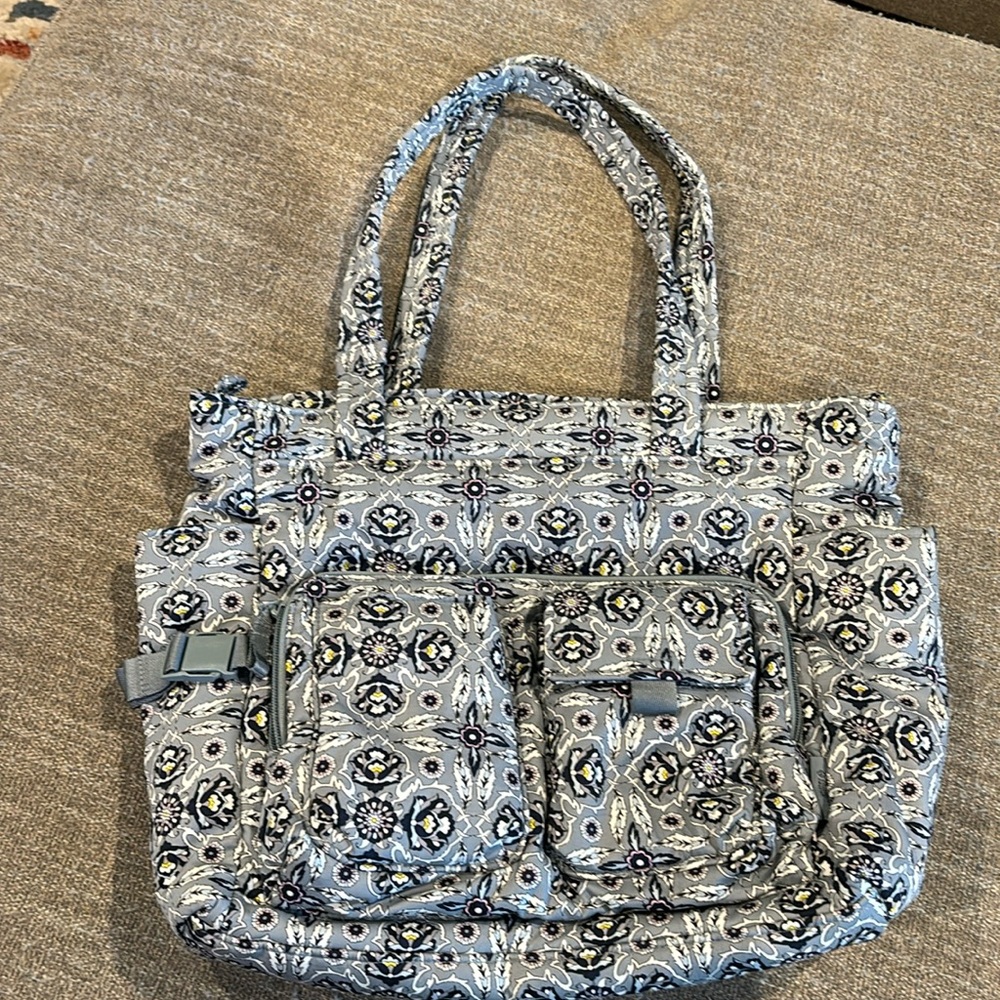 Large baby bag in pretty grey with pink accents design. 19’ wide x 14’ deep.
